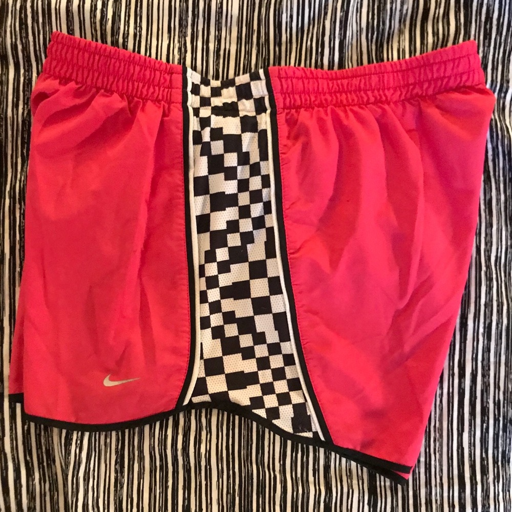 Pink Nike running shorts